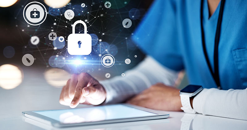 Doctor using tablet with data security icons