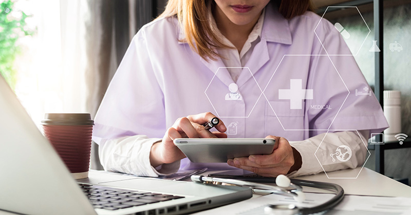 A3 - nurse reviewing billing.