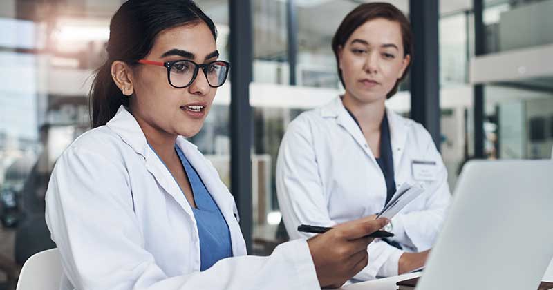 Doctor seeing Laptop