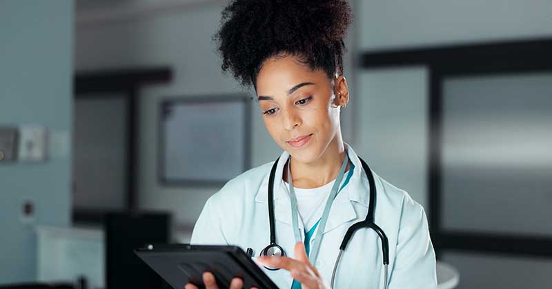 Doctor watching tablet