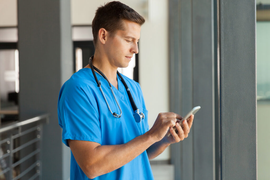 modern medical professional using smart phone