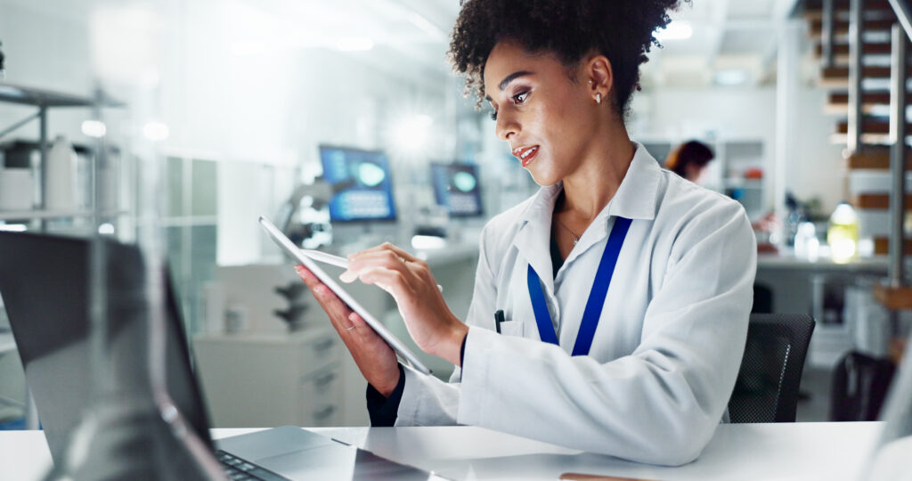 Woman, scientist and research with tablet for results, medical study or new discovery on experiment test or exam at lab. Female person or biologist with technology for scientific data at laboratory.