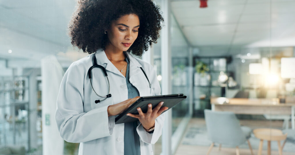 How Better Clinical Documentation Improves Billing Workflows Tablet, doctor and hospital woman reading medicine study, cardiology report and check healthcare data, insight or statistics. Scroll, analysis and medical surgeon, nurse and clinic worker search web.