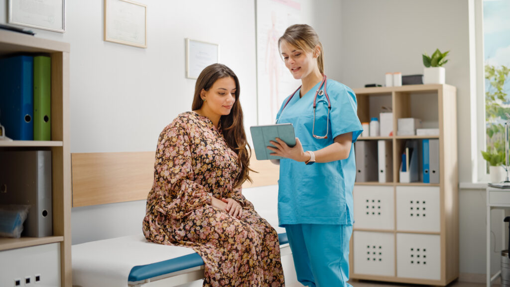 How a Modern Patient Portal Improves Engagement and Cuts Admin Work Doctor Consultation Office: Female Patient Listens to Experienced Head Nurse who Uses Digital Tablet Computer to Show, Explain Her Analysis Results, Give Advice, Prescribe Medicine. Gynecology ward